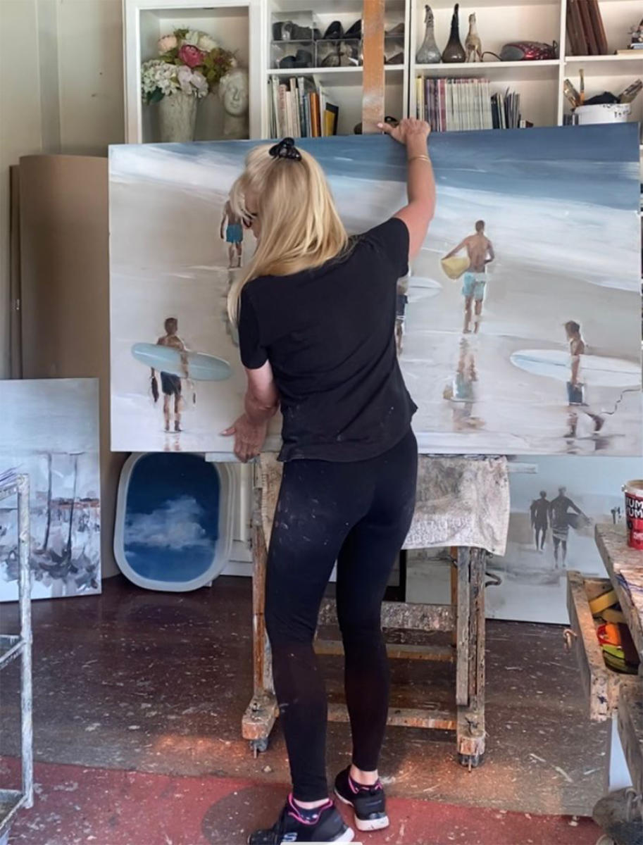 Nicole Pletts painting in studio